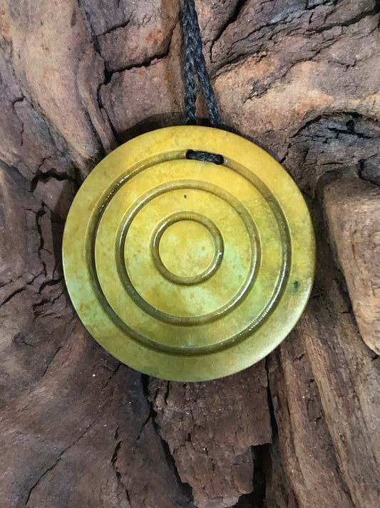 Bespoke flower jade disc pendant