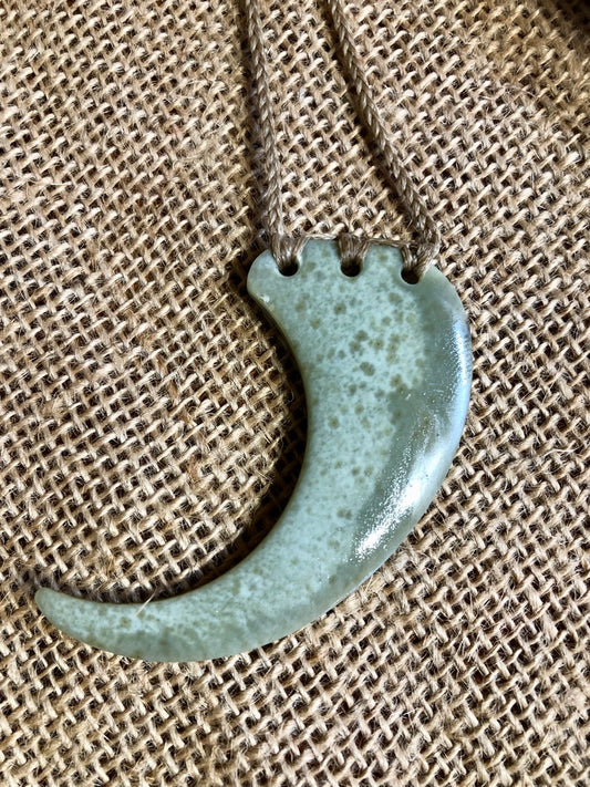 Eagle claw pendant